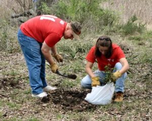 Two people doing field work