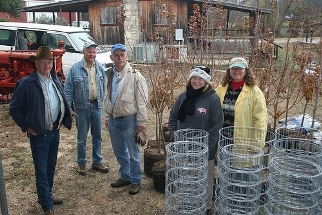 Image of a group of people standing outdoors in the winter
