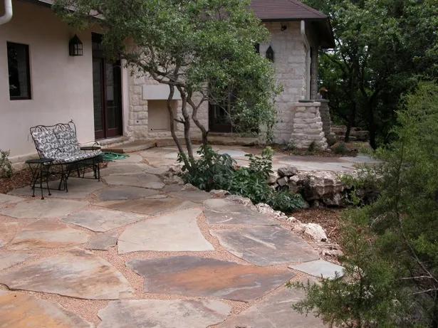 Patio surrounded by natural foliage